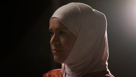 Studio-Portrait-Of-Muslim-Woman-Wearing-Hijab-Against-Plain-Background-2